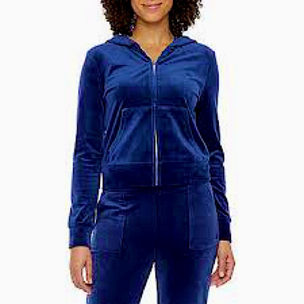 Pants and zip up jacket come together